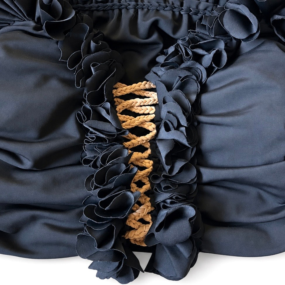 Handmade onyx black flower lei off-the-shoulder top with open lace up center detail.