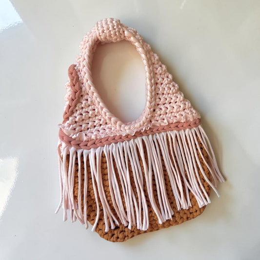 CROCHETED MINI FRINGE WRISTLET • pink and leather